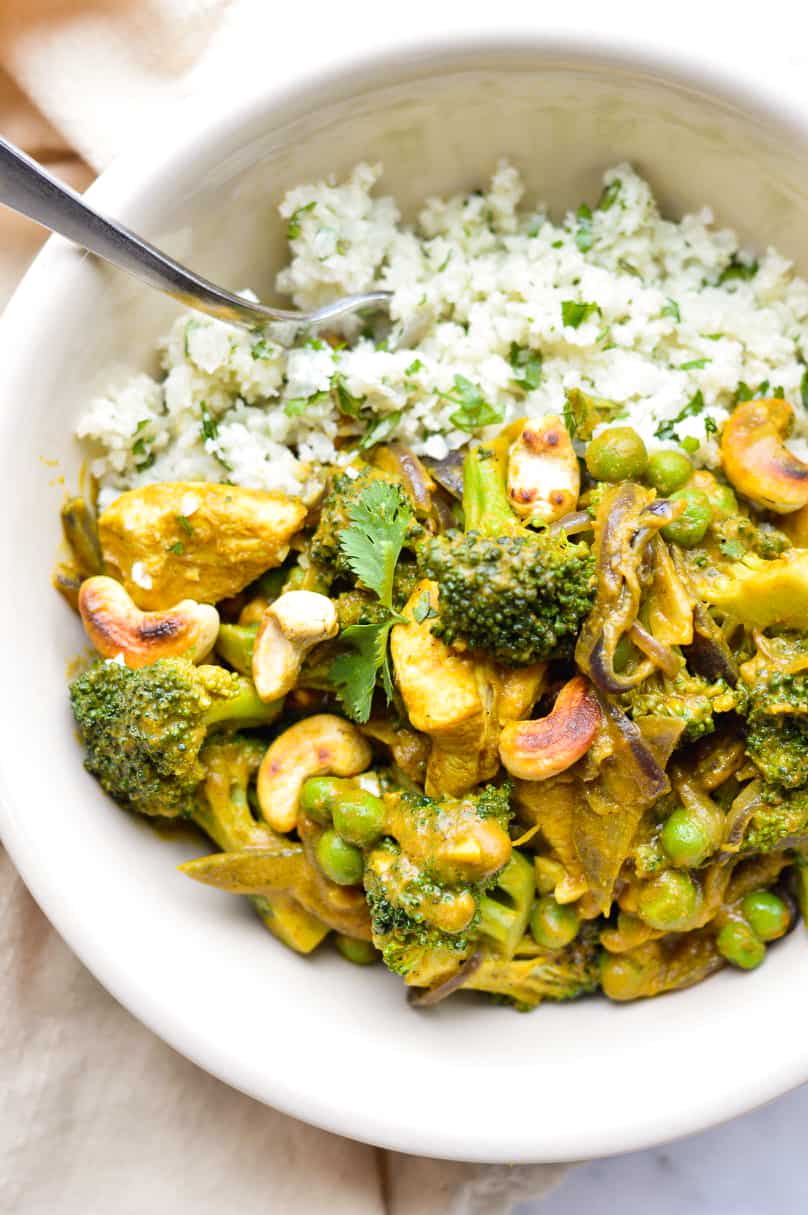 Pumpkin Cashew Curry with Cauliflower Coconut Rice in bowl
