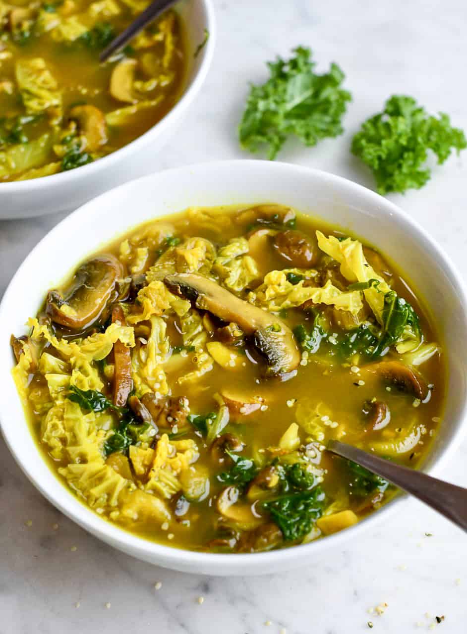 Healing Mushroom and Cabbage Soup close up with spoon