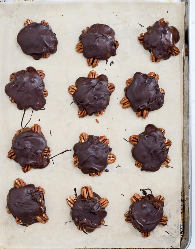 Chocolate Turtle Candies (Paleo Vegan) topped with chocolate