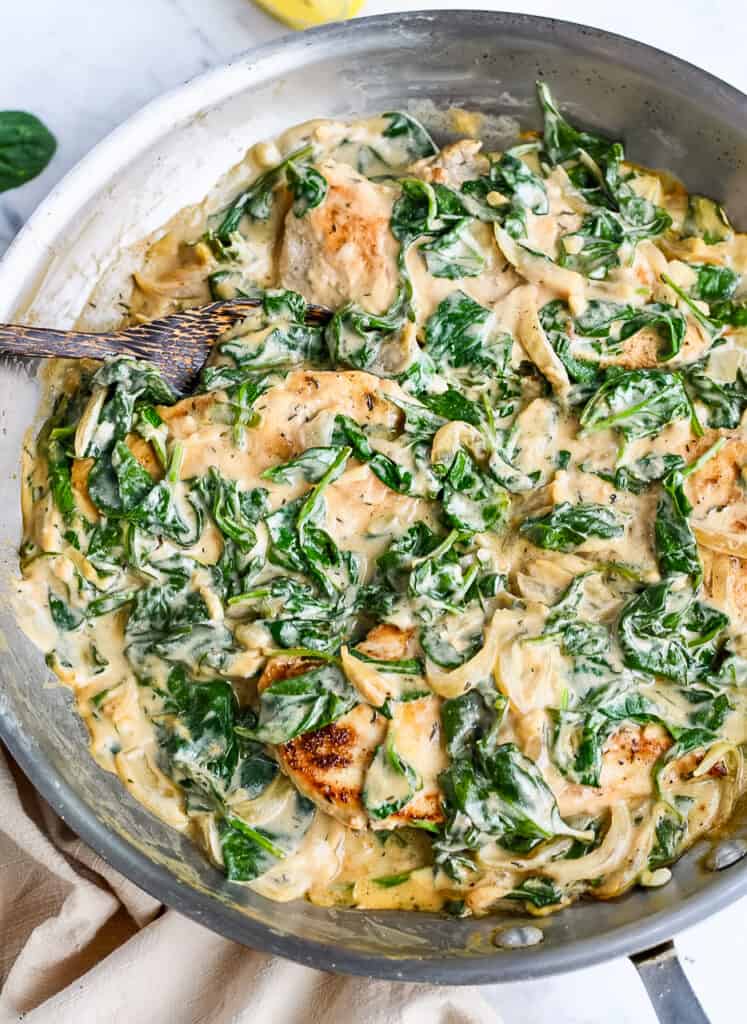  Creamy Spinach Chicken with serving spoon