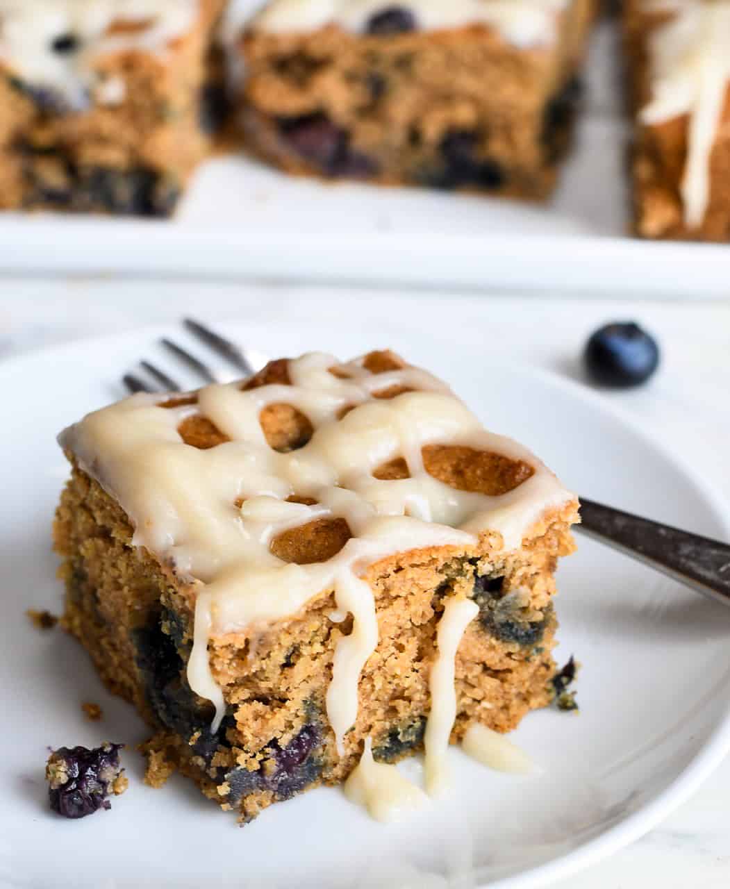 Paleo Blueberry Coffee Cake on plate with fork