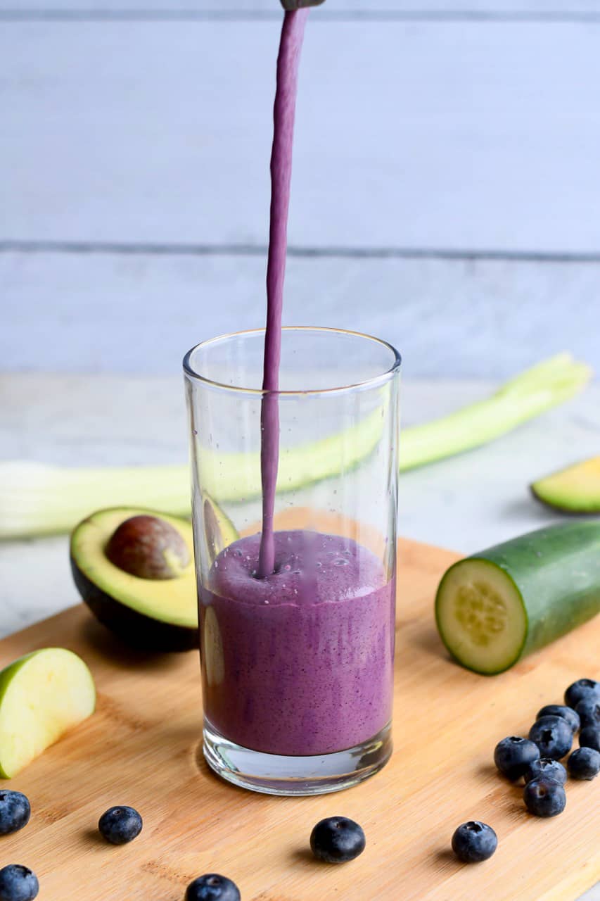 Gut Healing Blueberry Smoothie pouring half glass