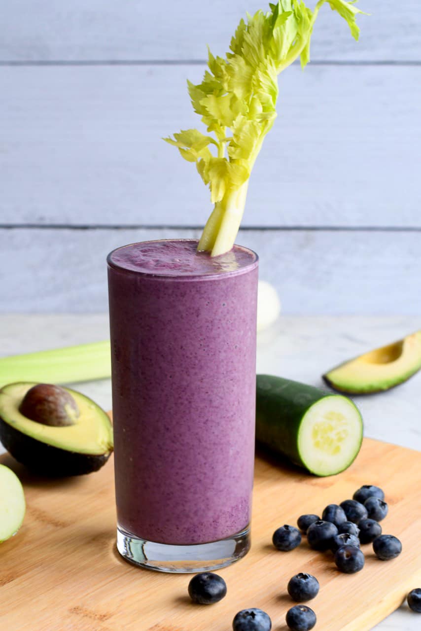 Gut Healing Blueberry Smoothie in glass with celery stalk