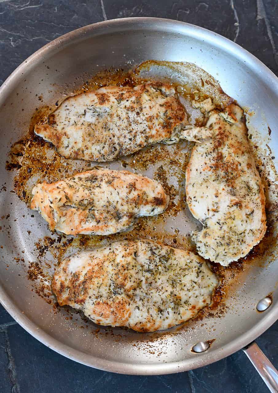 Paleo Mushroom Chicken cooking chicken in pan
