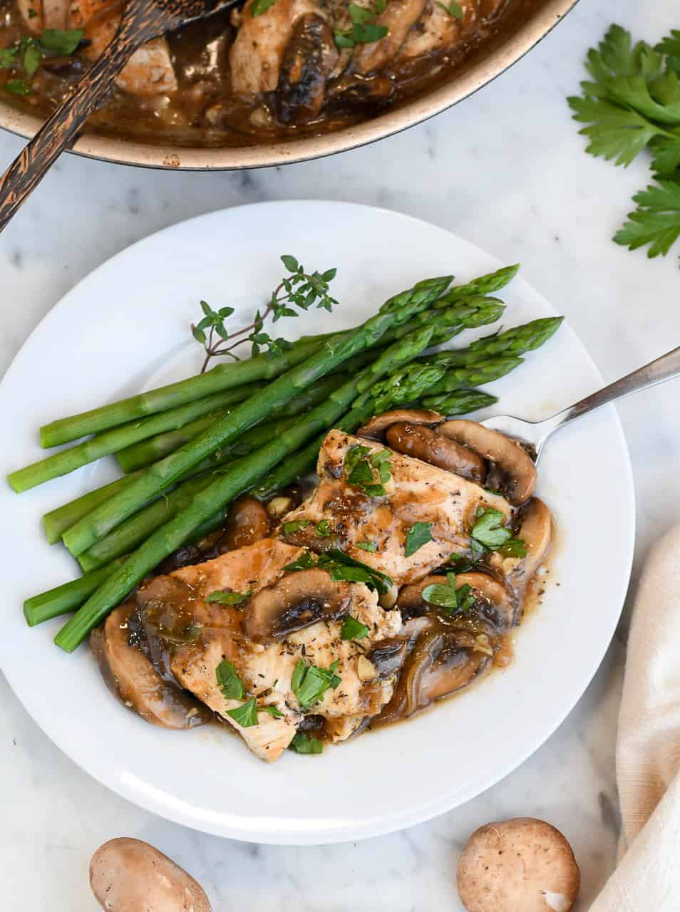 Paleo Mushroom Chicken on plate with asparagus