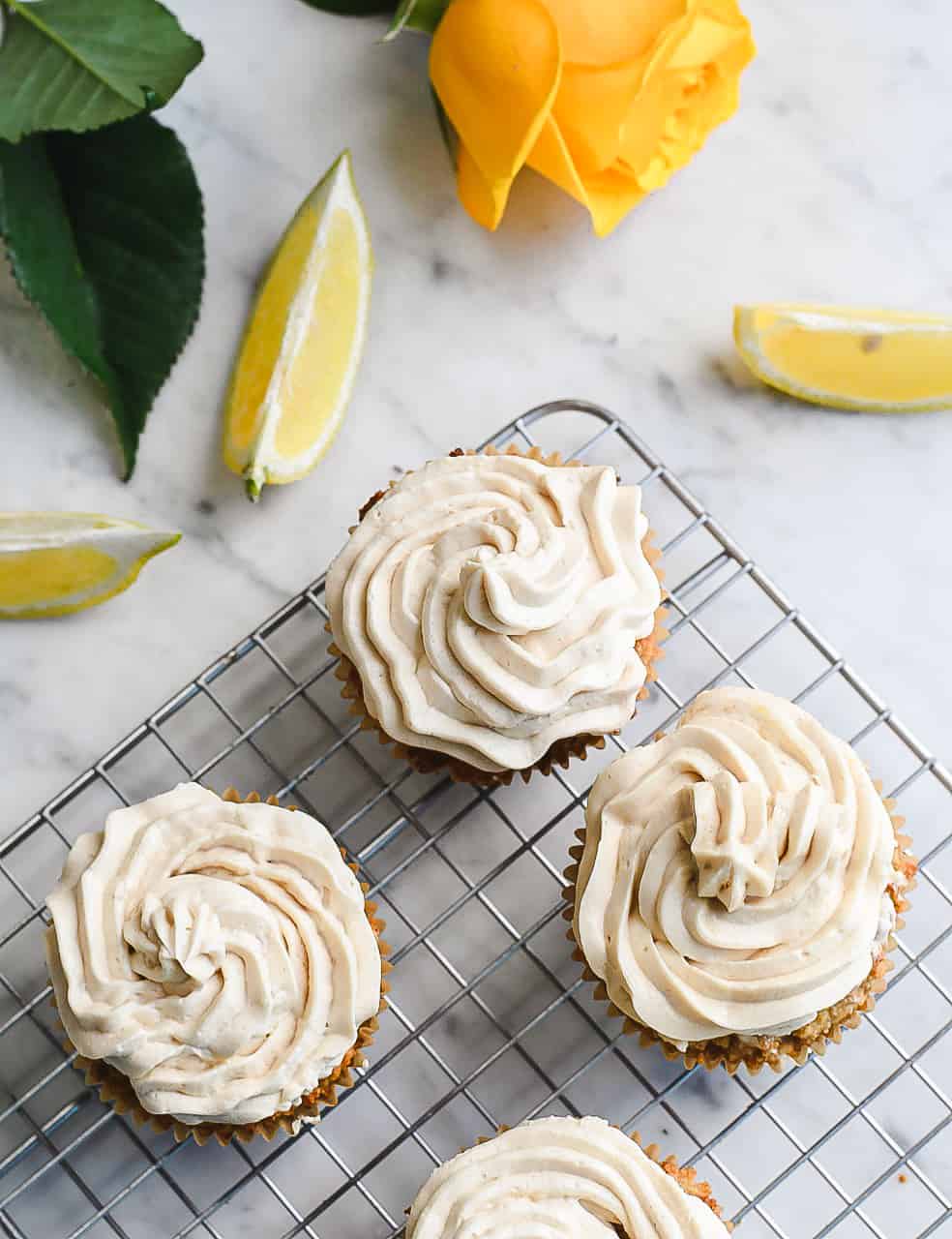 Lemon Cupcakes with Vanilla Frosting on wire rack