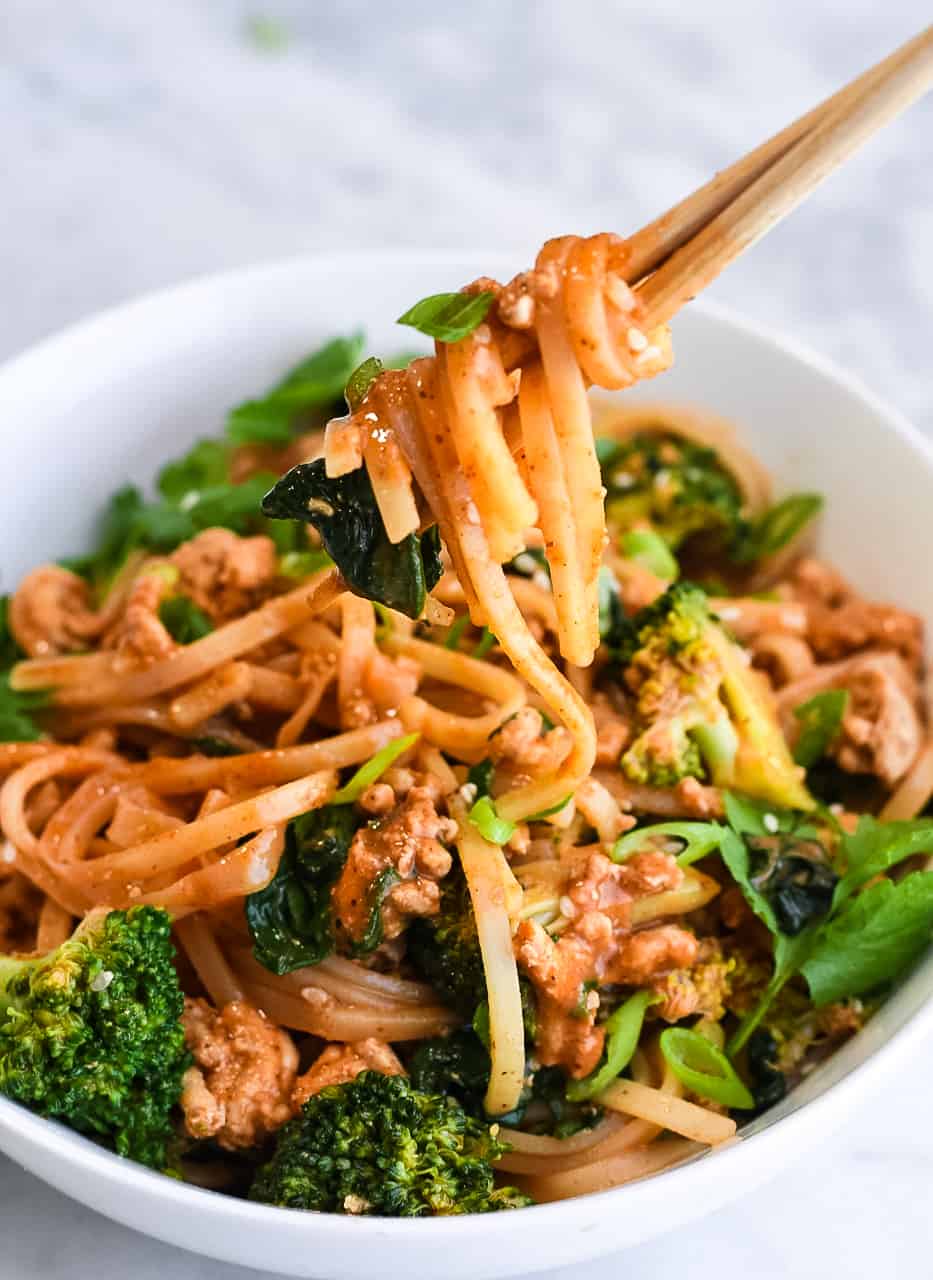 Easy Gochujang Noodles with Vegetables and Chicken in bowl with chopsticks