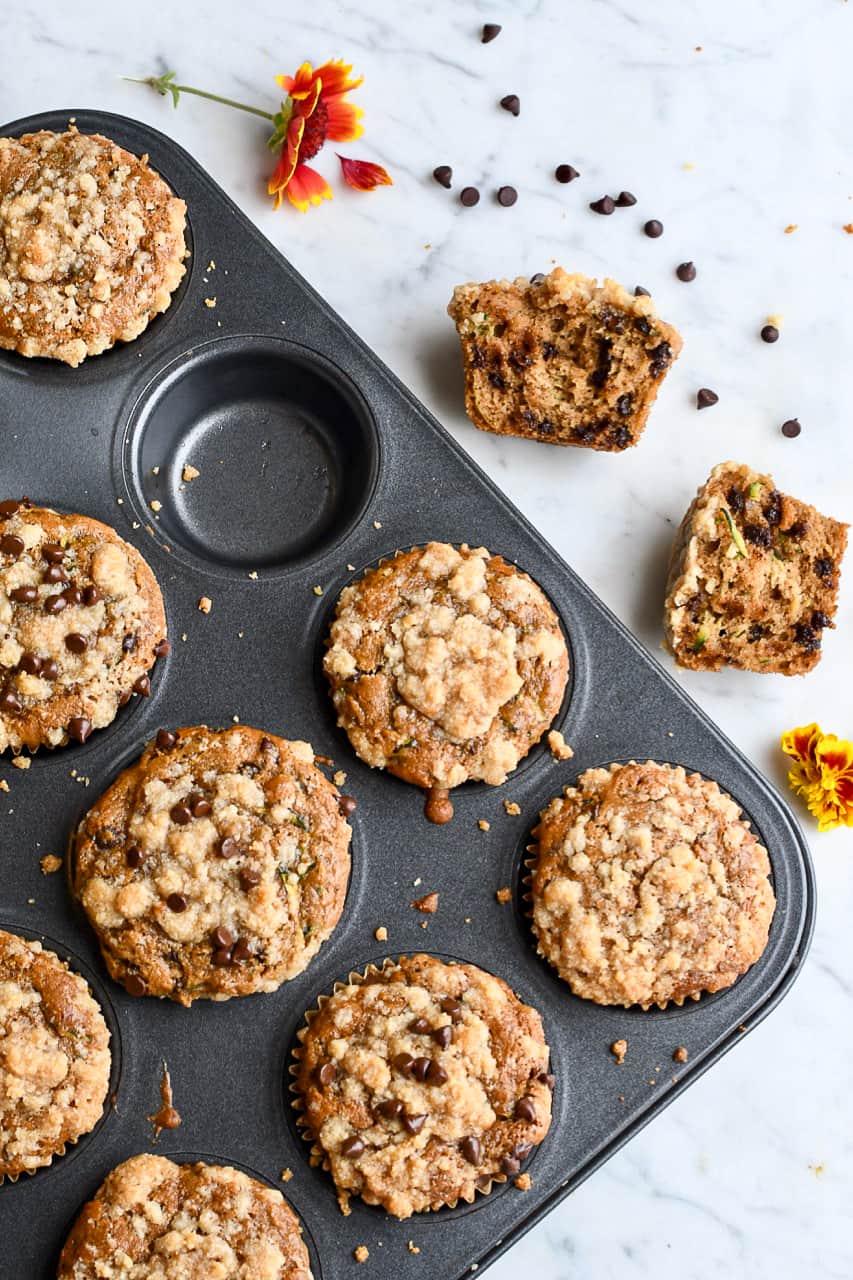 Paleo Zucchini Chocolate Chip Muffins pan with one taken out