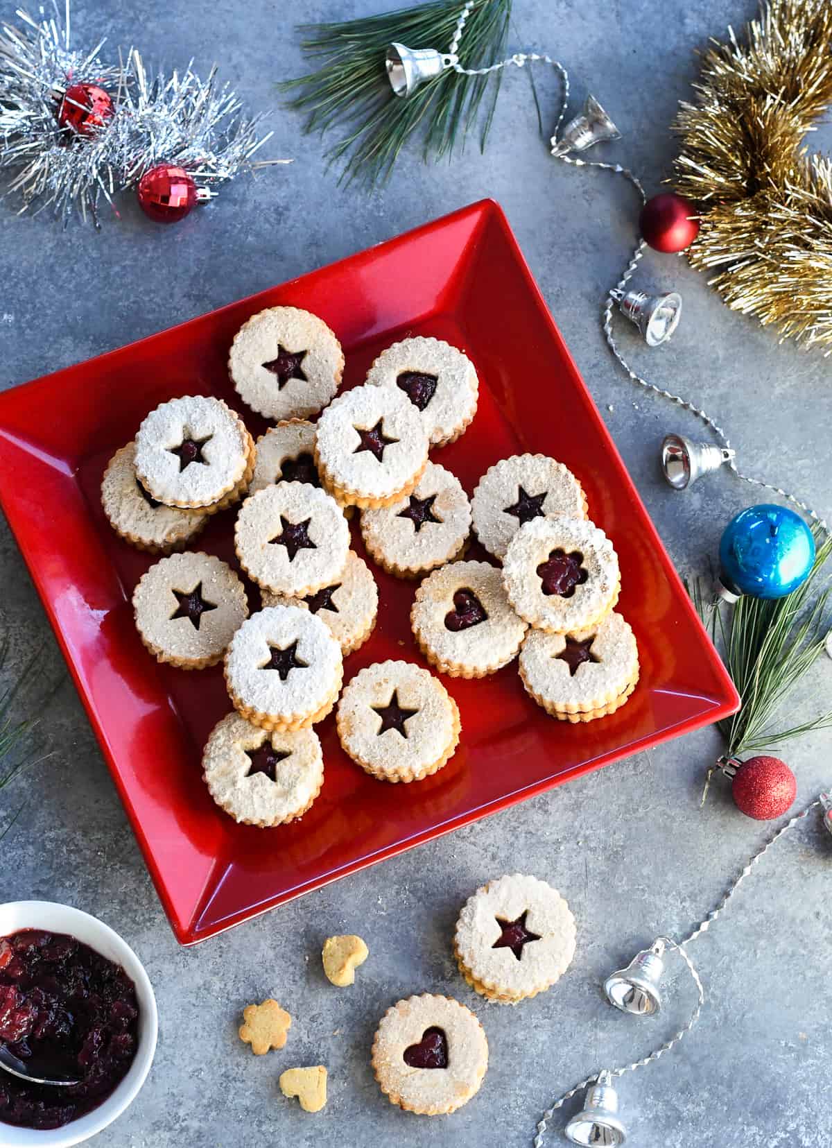 Gluten Free Linzer Cookies on red plate