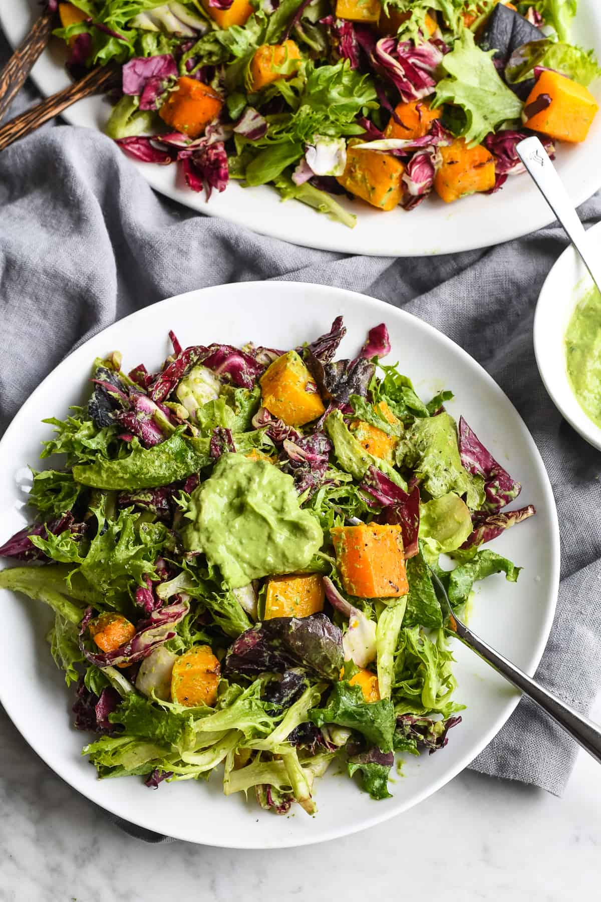 Bitter Spring Greens Salad with Roasted Butternut Squash on plate