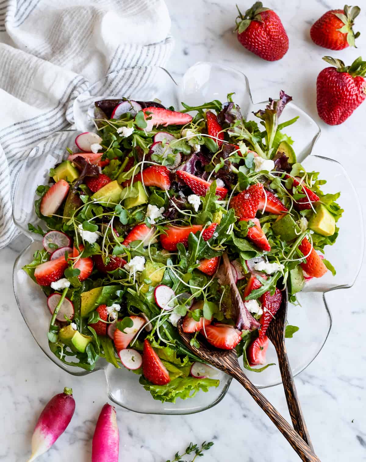 strawberry fields salad on a platter