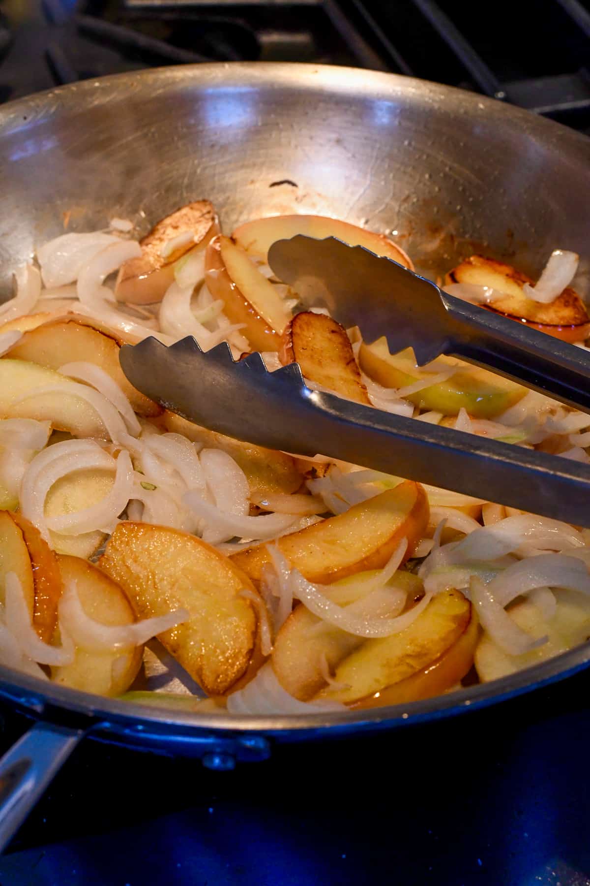 Easy Sautéed Chicken and Apples sauteed apples and onions in pan