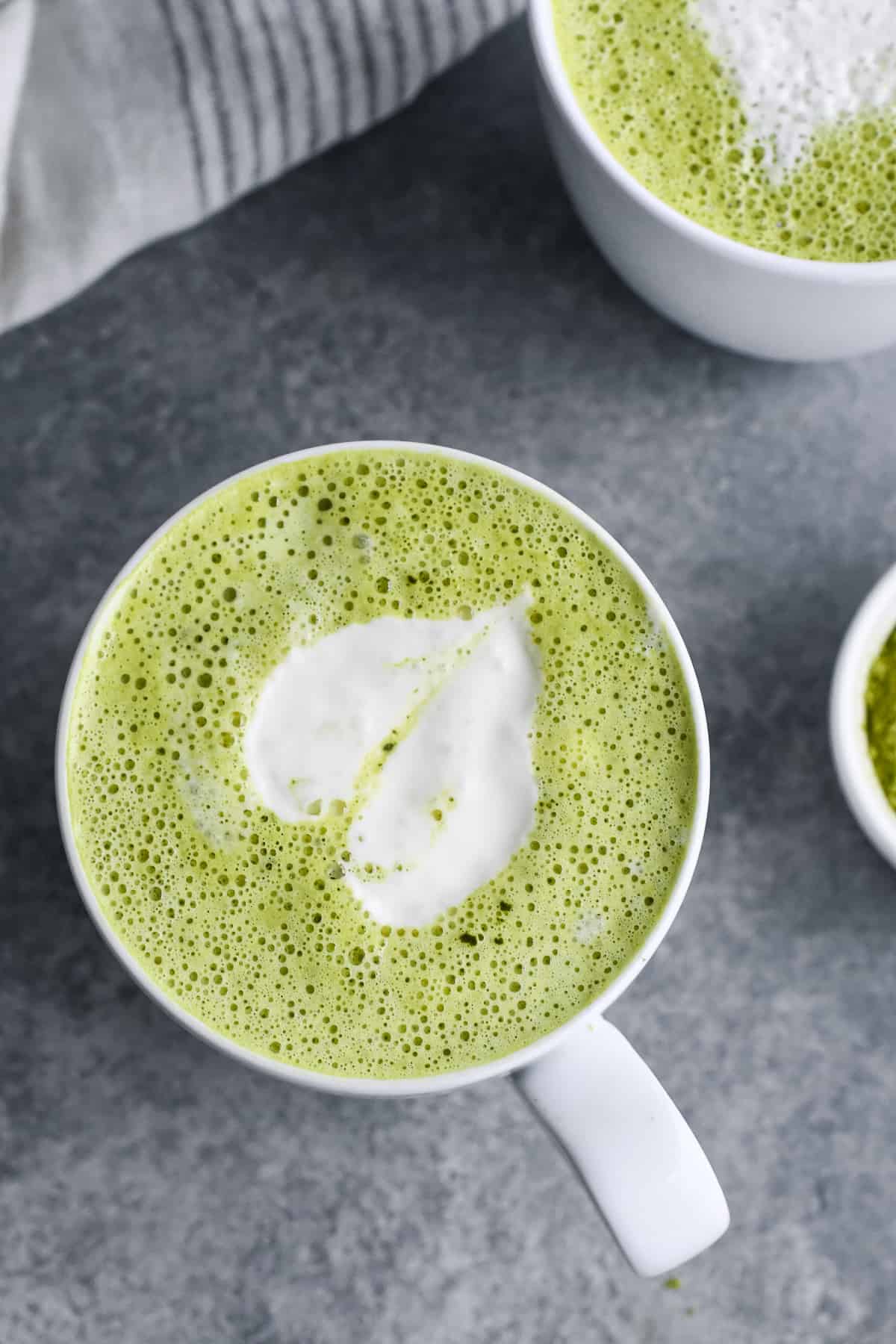 Easy Homemade Matcha Latte cup alone with heart shaped milk