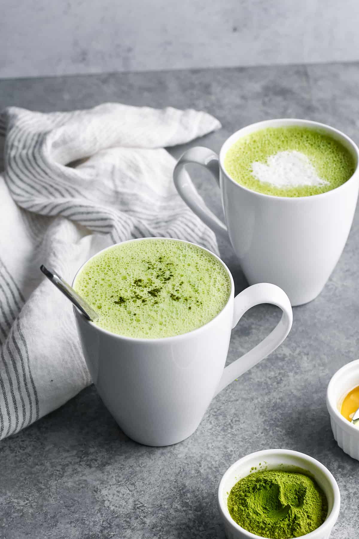 Easy Homemade Matcha Latte side view 2 cups napkin and spoon