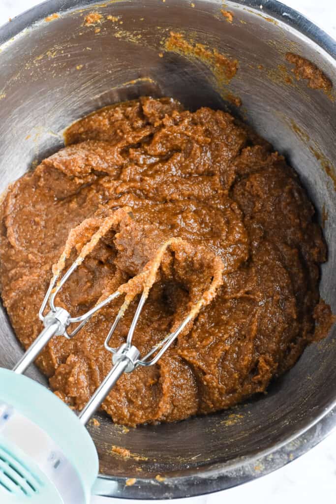 Fresh Ginger Cookies mixed batter in a bowl with mixer