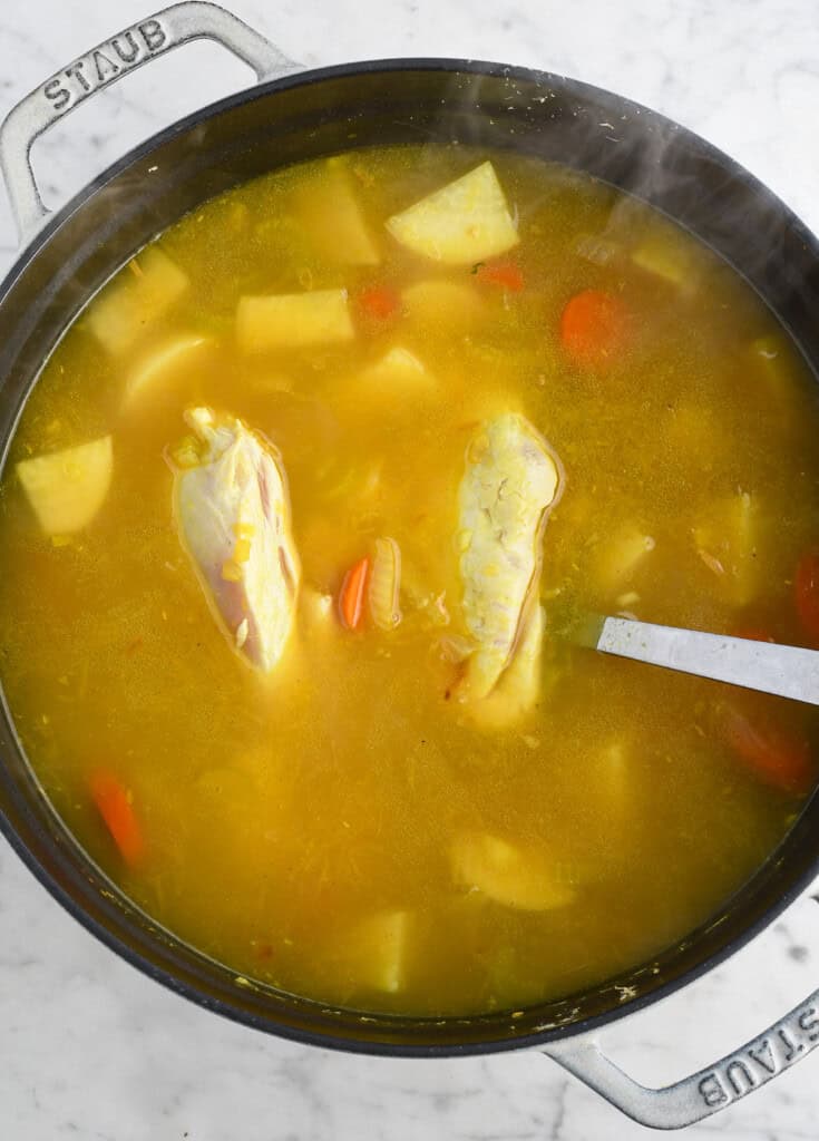 Immunity Boosting Soup broth with whole chicken breasts