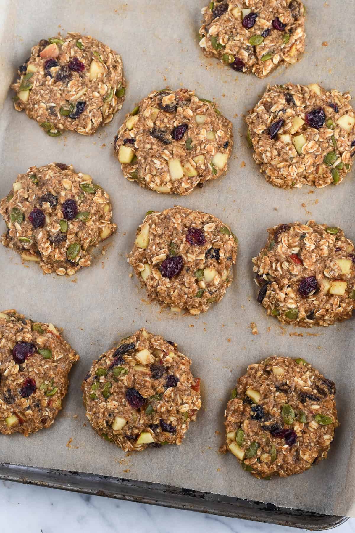 Healthy Apple Breakfast Cookies raw cookies on parchment