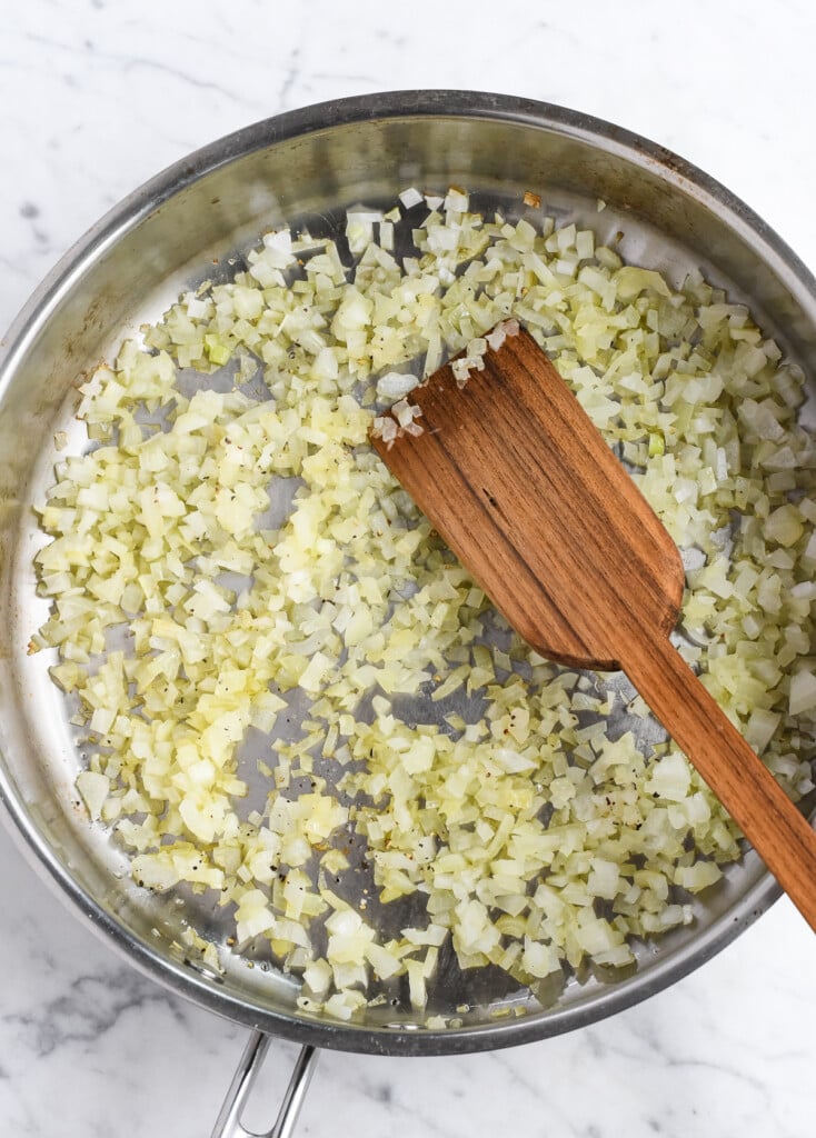 Saffron Risotto with Peas sauteeing onions